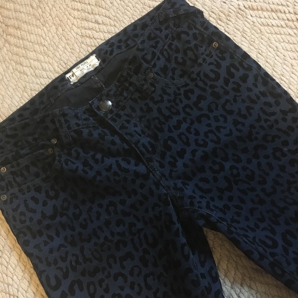 Free People Denim - 8” Rise Blue Leopard Skinny’s by Free People.
